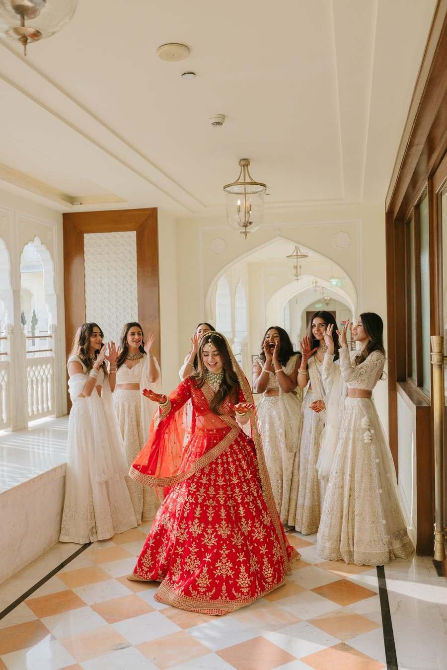 Bride twirling with bridesmaids — Story Event Planner